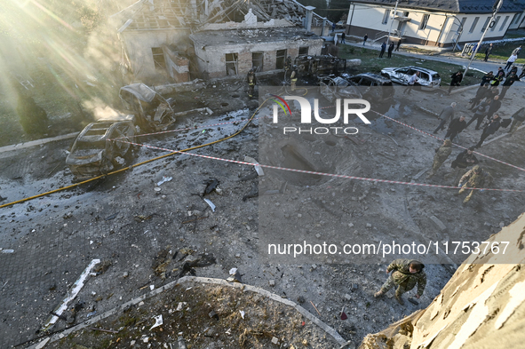 Rescuers are at an oncology dispensary damaged by a Russian guided bomb in Zaporizhzhia, Ukraine, on November 7, 2024. Eight people, includi...