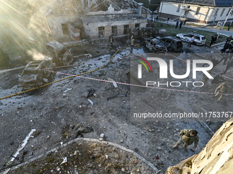 Rescuers are at an oncology dispensary damaged by a Russian guided bomb in Zaporizhzhia, Ukraine, on November 7, 2024. Eight people, includi...