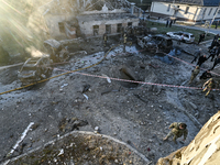 Rescuers are at an oncology dispensary damaged by a Russian guided bomb in Zaporizhzhia, Ukraine, on November 7, 2024. Eight people, includi...