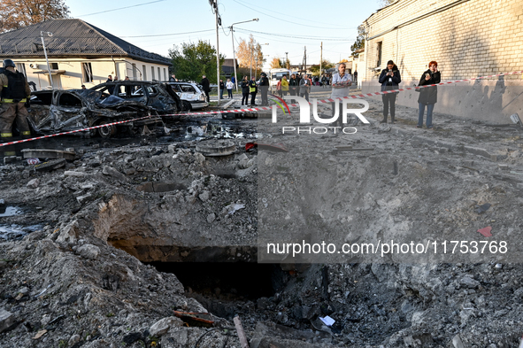 The crater from a Russian guided bomb is at an oncology dispensary in Zaporizhzhia, southeastern Ukraine, on November 7, 2024. Eight people,...