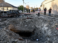 The crater from a Russian guided bomb is at an oncology dispensary in Zaporizhzhia, southeastern Ukraine, on November 7, 2024. Eight people,...