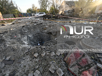 The crater from a Russian guided bomb is at an oncology dispensary in Zaporizhzhia, southeastern Ukraine, on November 7, 2024. Eight people,...