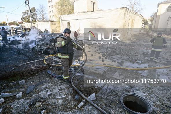 Rescuers work at an oncology dispensary damaged by a Russian guided bomb strike in Zaporizhzhia, Ukraine, on November 7, 2024. Eight people,...