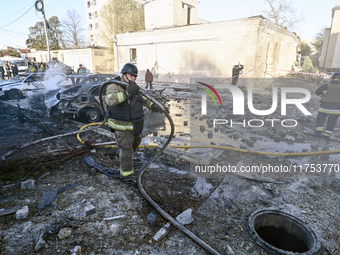 Rescuers work at an oncology dispensary damaged by a Russian guided bomb strike in Zaporizhzhia, Ukraine, on November 7, 2024. Eight people,...