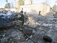 Rescuers work at an oncology dispensary damaged by a Russian guided bomb strike in Zaporizhzhia, Ukraine, on November 7, 2024. Eight people,...