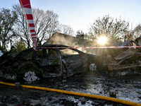 Burnt-out cars are at an oncology dispensary damaged by a Russian guided bomb strike in Zaporizhzhia, Ukraine, on November 7, 2024. Eight pe...