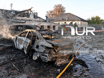 Burnt-out cars are at an oncology dispensary damaged by a Russian guided bomb strike in Zaporizhzhia, Ukraine, on November 7, 2024. Eight pe...