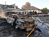 Burnt-out cars are at an oncology dispensary damaged by a Russian guided bomb strike in Zaporizhzhia, Ukraine, on November 7, 2024. Eight pe...