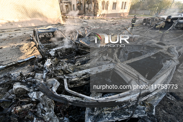 Burnt-out cars are at an oncology dispensary damaged by a Russian guided bomb strike in Zaporizhzhia, Ukraine, on November 7, 2024. Eight pe...