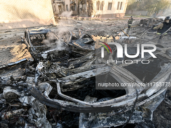 Burnt-out cars are at an oncology dispensary damaged by a Russian guided bomb strike in Zaporizhzhia, Ukraine, on November 7, 2024. Eight pe...