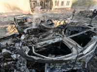 Burnt-out cars are at an oncology dispensary damaged by a Russian guided bomb strike in Zaporizhzhia, Ukraine, on November 7, 2024. Eight pe...