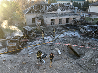 Rescuers are at an oncology dispensary damaged by a Russian guided bomb in Zaporizhzhia, Ukraine, on November 7, 2024. Eight people, includi...