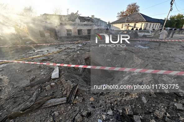 The crater from a Russian guided bomb is at an oncology dispensary in Zaporizhzhia, southeastern Ukraine, on November 7, 2024. Eight people,...