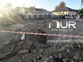 The crater from a Russian guided bomb is at an oncology dispensary in Zaporizhzhia, southeastern Ukraine, on November 7, 2024. Eight people,...