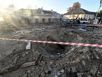 The crater from a Russian guided bomb is at an oncology dispensary in Zaporizhzhia, southeastern Ukraine, on November 7, 2024. Eight people,...