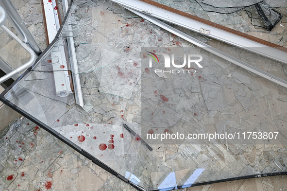 Blood drops stain glass shards at an oncology dispensary damaged by a Russian guided bomb strike in Zaporizhzhia, Ukraine, on November 7, 20...