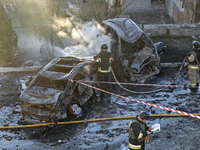 Rescuers put out burning cars at an oncology dispensary damaged by a Russian guided bomb in Zaporizhzhia, Ukraine, on November 7, 2024. Eigh...