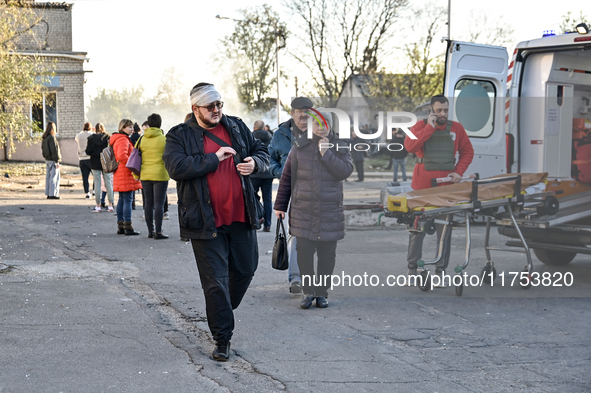 People are at an oncology dispensary damaged by a Russian guided bomb strike in Zaporizhzhia, Ukraine, on November 7, 2024. Eight people, in...