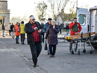 People are at an oncology dispensary damaged by a Russian guided bomb strike in Zaporizhzhia, Ukraine, on November 7, 2024. Eight people, in...