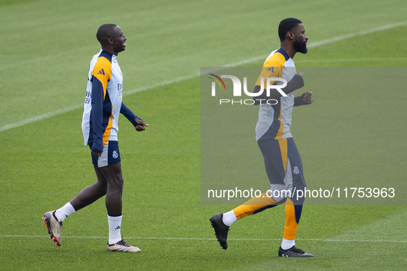 Ferland Mendy (left) and Antonio Rudiger (right) of Real Madrid CF train during the Real Madrid training session and press conference ahead...