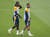 Eduardo Camavinga (left) and Kylian Mbappe (right) of Real Madrid CF train during the Real Madrid training session and press conference ahea...