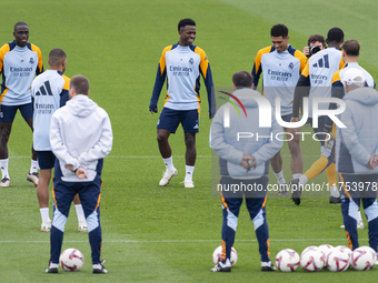 Real Madrid players (from left to right) Ferland Mendy, Vinicius Junior, and Jude Bellingham train during the Real Madrid training session a...