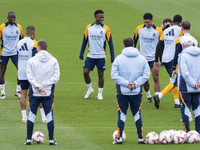 Real Madrid players (from left to right) Ferland Mendy, Vinicius Junior, and Jude Bellingham train during the Real Madrid training session a...