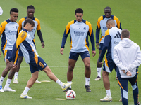 Real Madrid players (from left to right) Eder Militao, Raul Asencio, Eduardo Camavinga, Jude Bellingham, Ferland Mendy, and Kylian Mbappe tr...