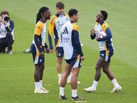 Real Madrid players (from L to R) Eduardo Camavinga, Raul Asencio, Jude Bellingham, and Vinicius Junior train during the Real Madrid trainin...