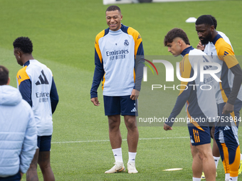 Kylian Mbappe of Real Madrid CF (C) trains during the Real Madrid training session and press conference ahead of the La Liga 2024/25 match a...