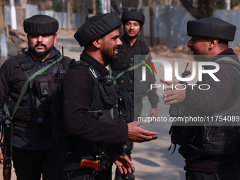 Indian Army soldiers smile after killing two militants during an encounter in Sopore, Jammu and Kashmir, India, on November 8, 2024 (