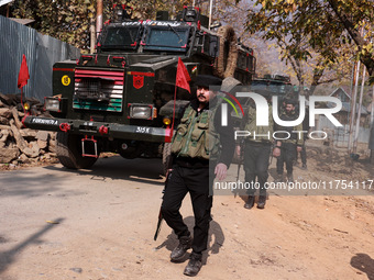 Indian army soldiers leave after killing two militants during an encounter in Sopore, Jammu and Kashmir, India, on November 8, 2024. (