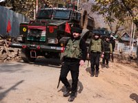 Indian army soldiers leave after killing two militants during an encounter in Sopore, Jammu and Kashmir, India, on November 8, 2024. (