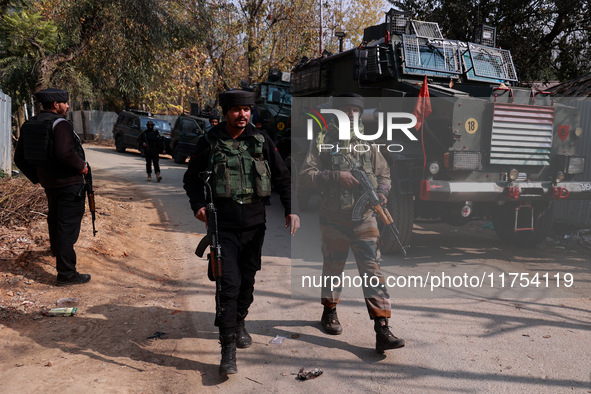 Indian Army soldiers leave after an encounter breaks out between militants and security forces in which two militants are killed in Sopore,...