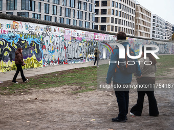  People visit East Side Gallery a day ahead of the 35th anniversary of the fall of the Berlin Wall. Berlin, Germany on 8 November, 2024. (