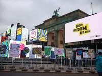 Artworks lined up in a four-kilometre-long open-air installation a day ahead of the 35th anniversary of the fall of the Berlin Wall. Berlin,...