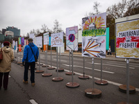 Artworks lined up in a four-kilometre-long open-air installation a day ahead of the 35th anniversary of the fall of the Berlin Wall. Berlin,...