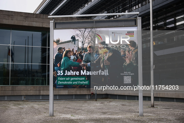 A banner is seen day ahead of the 35th anniversary of the fall of the Berlin Wall. Berlin, Germany on 8 November, 2024. 