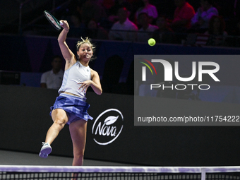 RIYADH, SAUDI ARABIA - NOVEMBER 08: Erin Routliffe (pictured) of New Zealand playing with Gabriela Dabrowski of Canada during their semi-fin...