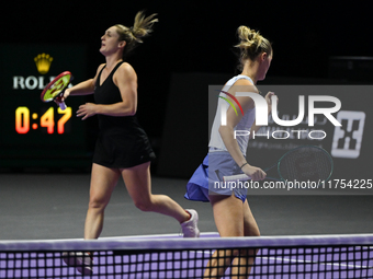 RIYADH, SAUDI ARABIA - NOVEMBER 08: Gabriela Dabrowski (L) of Canada and Erin Routliffe (R) of New Zealand during their semi-final match aga...