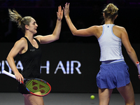 RIYADH, SAUDI ARABIA - NOVEMBER 08: Gabriela Dabrowski (L) of Canada and Erin Routliffe (R) of New Zealand during their semi-final match aga...