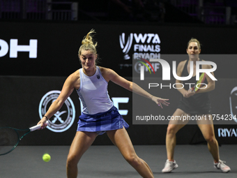 RIYADH, SAUDI ARABIA - NOVEMBER 08: Gabriela Dabrowski (R) of Canada and Erin Routliffe (L) of New Zealand during their semi-final match aga...