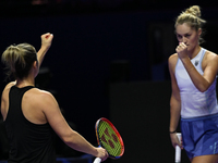 RIYADH, SAUDI ARABIA - NOVEMBER 08: Gabriela Dabrowski (L) of Canada playing with Erin Routliffe (R) of New Zealand during their semi-final...