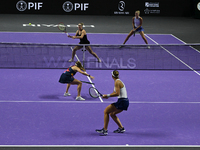 RIYADH, SAUDI ARABIA - NOVEMBER 08: Nicole Melichar-Martinez of USA and Ellen Perez of Australia during their semi-final match against Gabri...