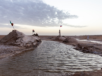 Salty water is seen as sun rises over Chott el Djerid salt lake in eastern Sahara, Tunisia on October 29, 2024. Chott el Djerid is the bigge...