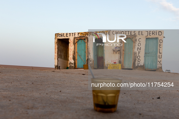 Public toilets are seen as sun rises over Chott el Djerid salt lake in eastern Sahara, Tunisia on October 29, 2024. Chott el Djerid is the b...