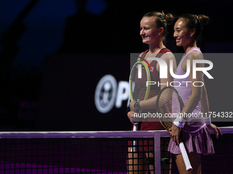 RIYADH, SAUDI ARABIA - NOVEMBER 08: Barbora Krejcikova (L) of Czech Republic and Qinwen Zheng of China (R) before their semi-final match, on...