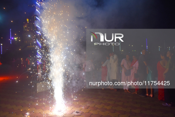 People light fireworks to celebrate the Chhath festival in Kolkata, India, on November 8, 2024. 