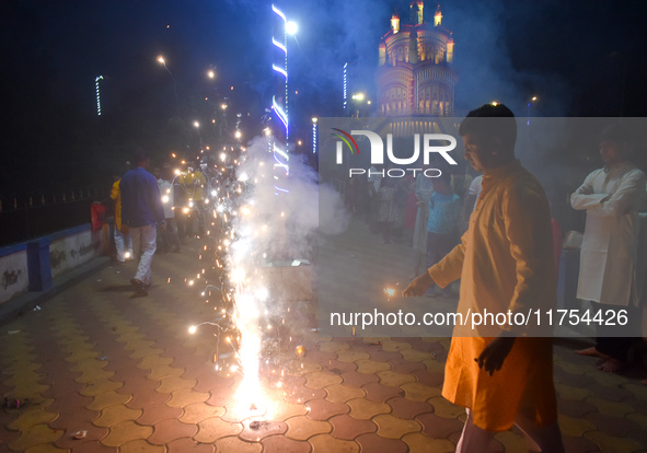 People light fireworks to celebrate the Chhath festival in Kolkata, India, on November 8, 2024. 