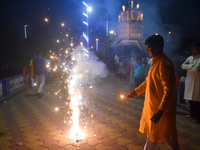 People light fireworks to celebrate the Chhath festival in Kolkata, India, on November 8, 2024. (